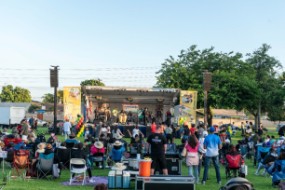 Picture of large audience in front of stage attending the 2025 Juneteenth Celebration of Freedom