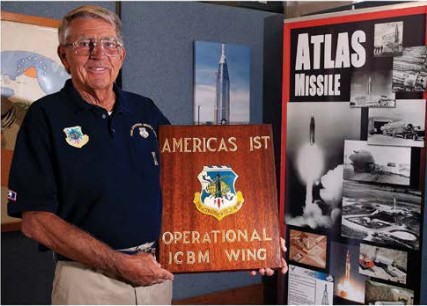 Jim Widlar holds plaque for America's 1st Operational ICBM wing