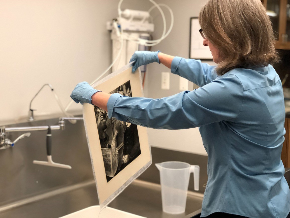 Virtual Converse with a Conservator: Preserving Works on Paper