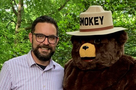 Matt Sellers with Smokey Bear