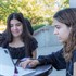 Two students using laptop Two students using laptop