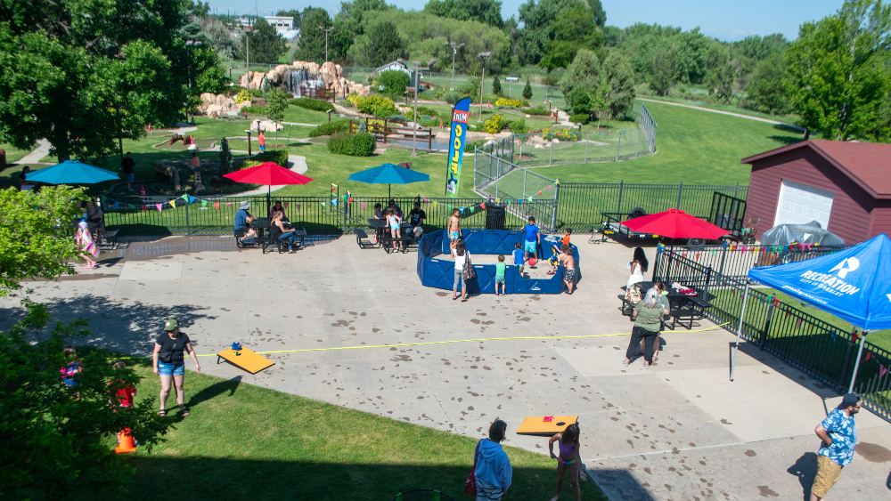 Families participate in carnival games and mini golf at the Family FunPlex