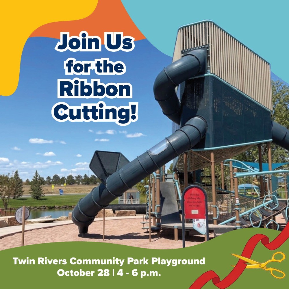 View of a tall play tower. Actual text reads, "Join Us for the Ribbon Cutting!"
