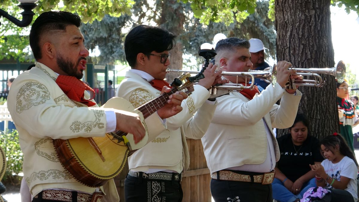 three mariachi musicians