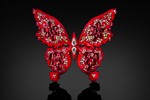 A vibrant red butterfly-shaped brooch called The Soul of Flame II.