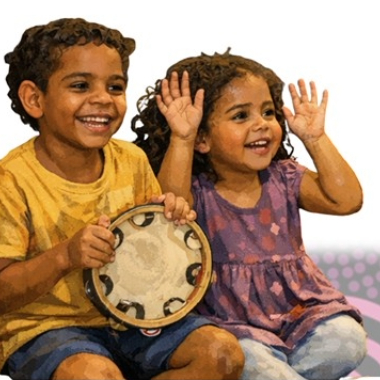 Two happy children with a tambourine