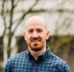 Portrait of invited speaker Alex Mullins