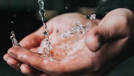 an image of hands being washed