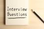 Interview Questions written on a post it note