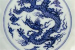 Blue dragon on a porcelain dish Blue dragon on a porcelain dish