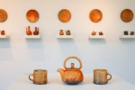 pottery displayed in a gallery pottery displayed in a gallery