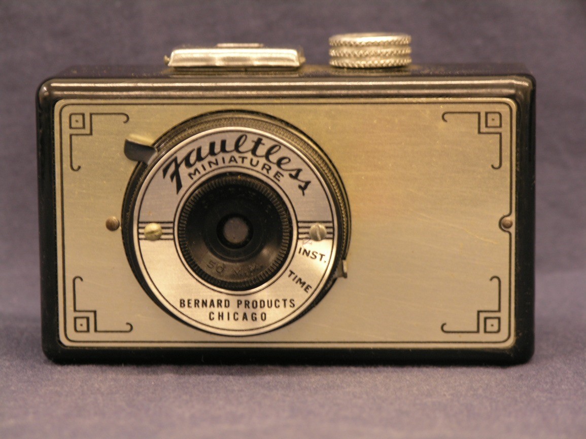 old camera with branding that says Faultless Miniature