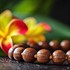 Kukui nut lei and yellow Hawaiian flower